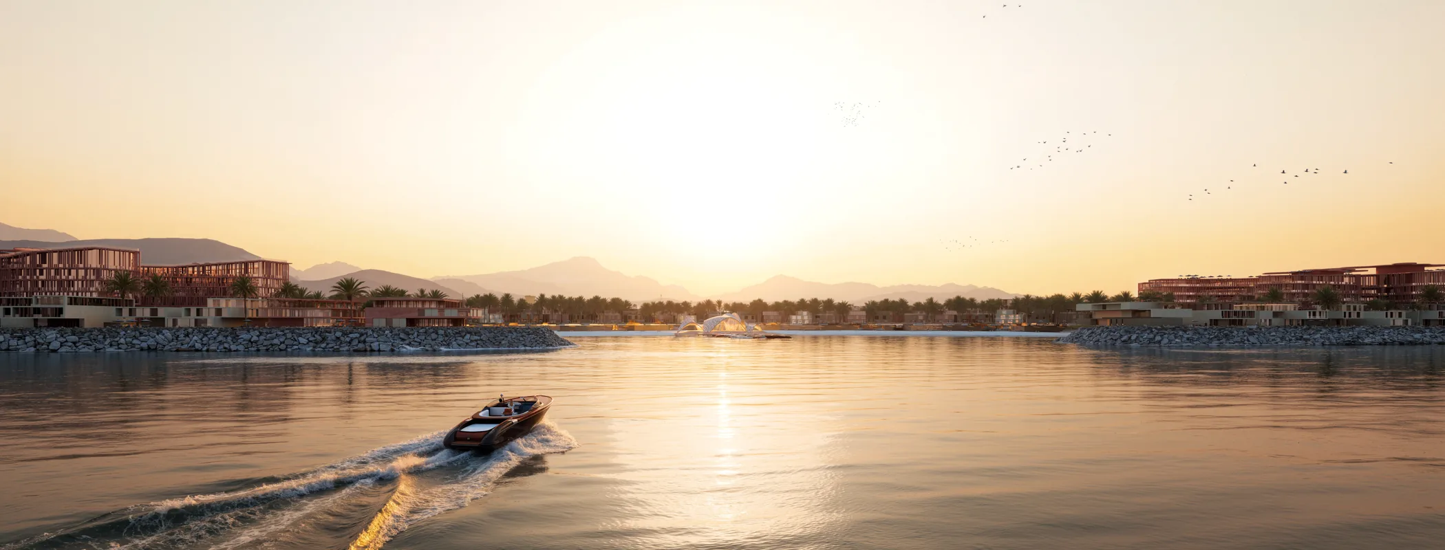 A boat crossing the bay at sunrise, with the Hajar mountains behind the shoreline